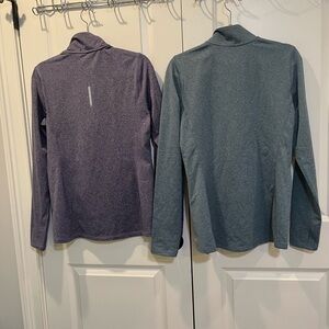 Bundle of two Reebok half zip pull over jackets. Size medium. Blue and green